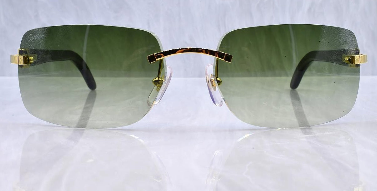Pre-Owned Cartier Black Buffalo horn sunglasses gold/olive gradient
