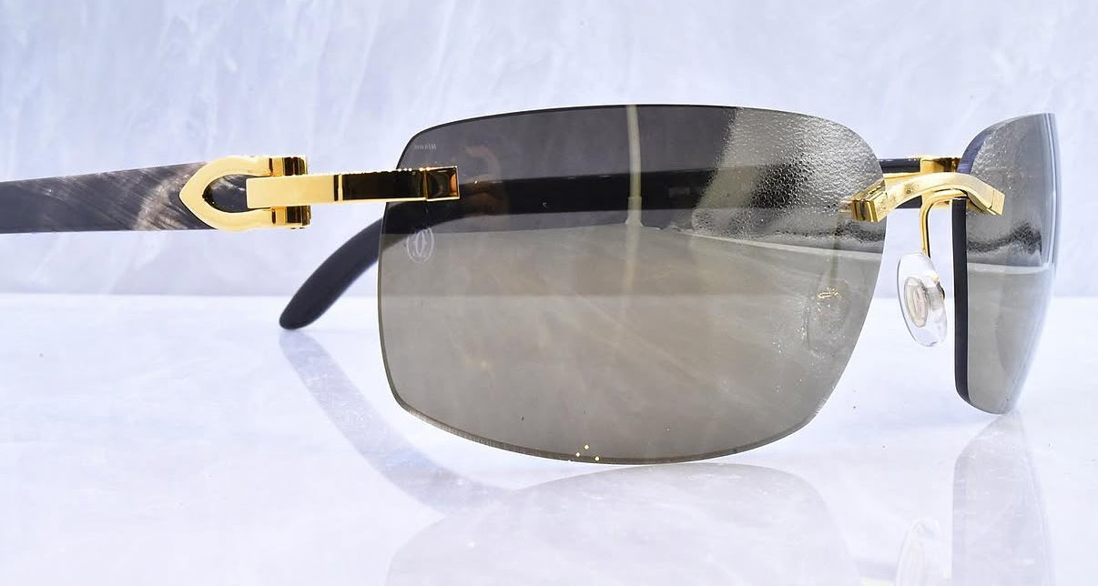 Pre-Owned Cartier Buffalo horn sunglasses gold/smoke gradient