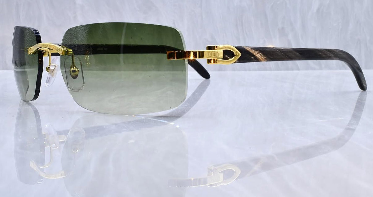 Pre-Owned Cartier Black Buffalo horn sunglasses gold/olive gradient