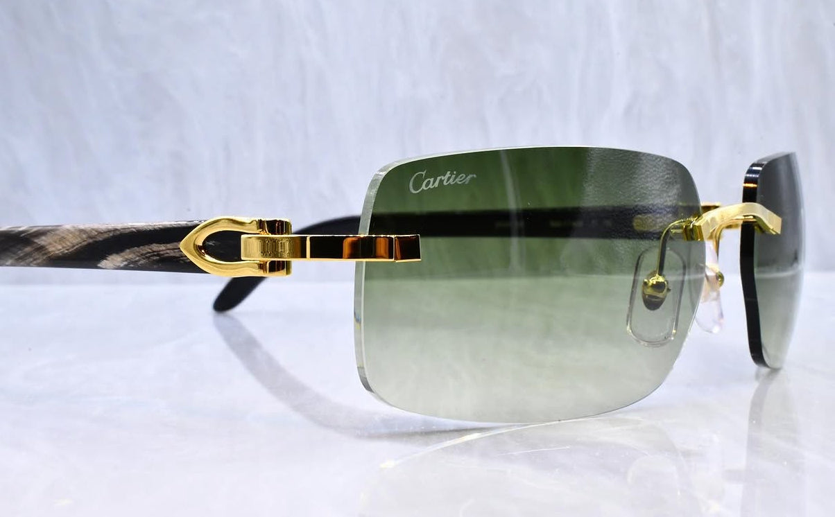 Pre-Owned Cartier Black Buffalo horn sunglasses gold/olive gradient