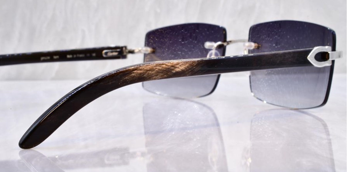 Pre-Owned Cartier Black Buffalo horn sunglasses Dark Gradient