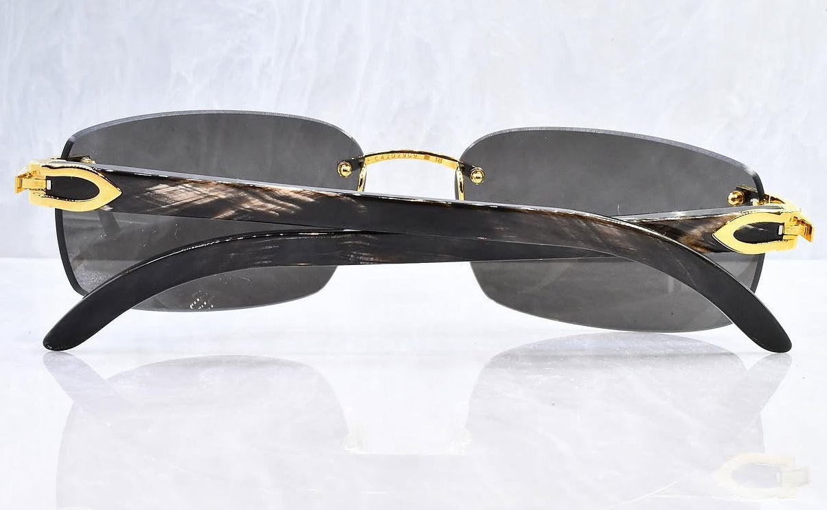Pre-Owned Cartier Buffalo horn sunglasses gold/smoke gradient