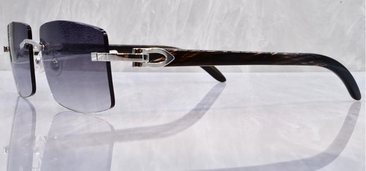 Pre-Owned Cartier Black Buffalo horn sunglasses Dark Gradient