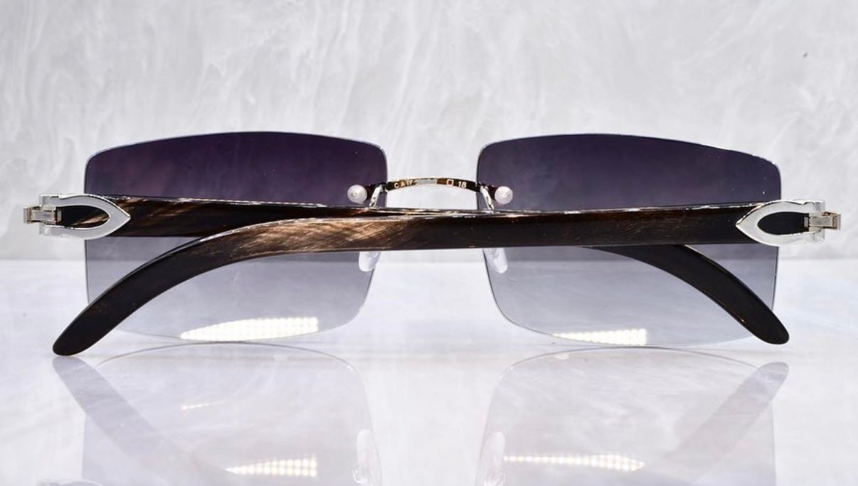 Pre-Owned Cartier Black Buffalo horn sunglasses Dark Gradient